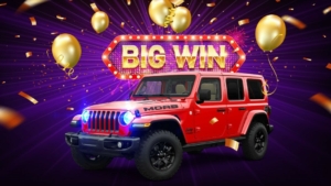 9c9c26ba-8414-11ec-a1a5-62898edc0f74 Red jeep wrangler with winning writing and symbols