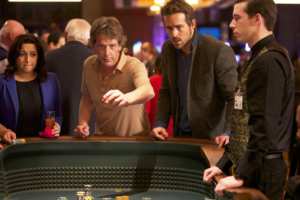 Ryan Reynolds & Ben Mendelsohn at casino table
